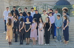 Group of people posing on stairs
